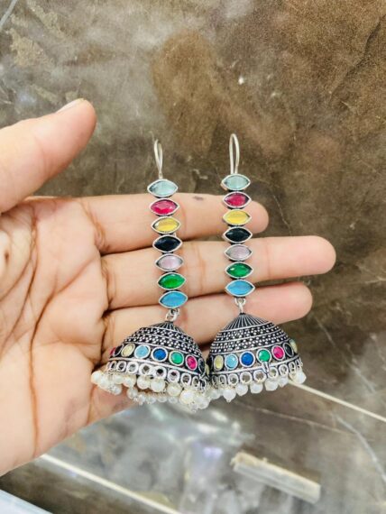 Different colour diamond earrings